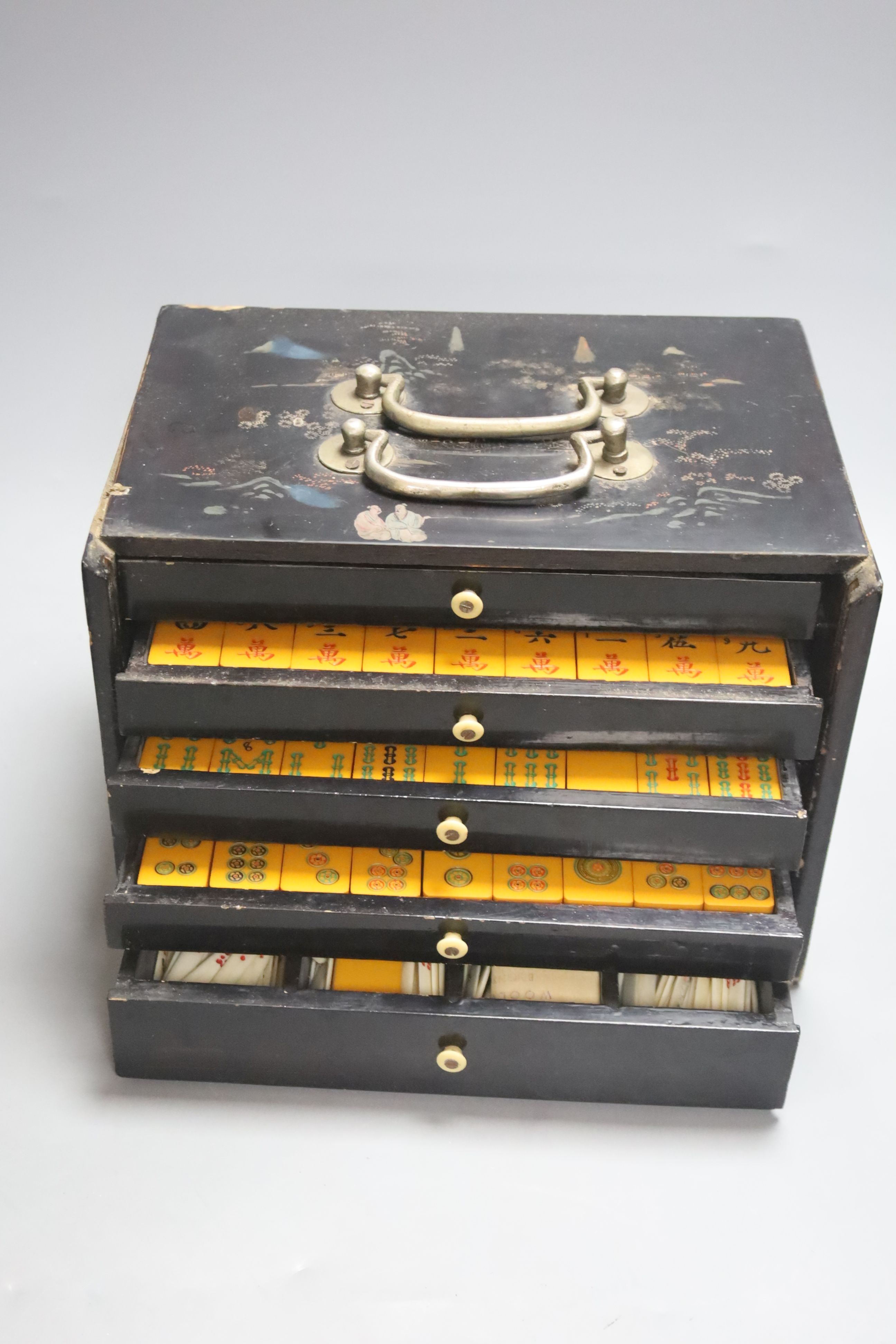 A Chinese lacquer cased Mah Jong set